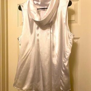White satin top. Non stretchy.